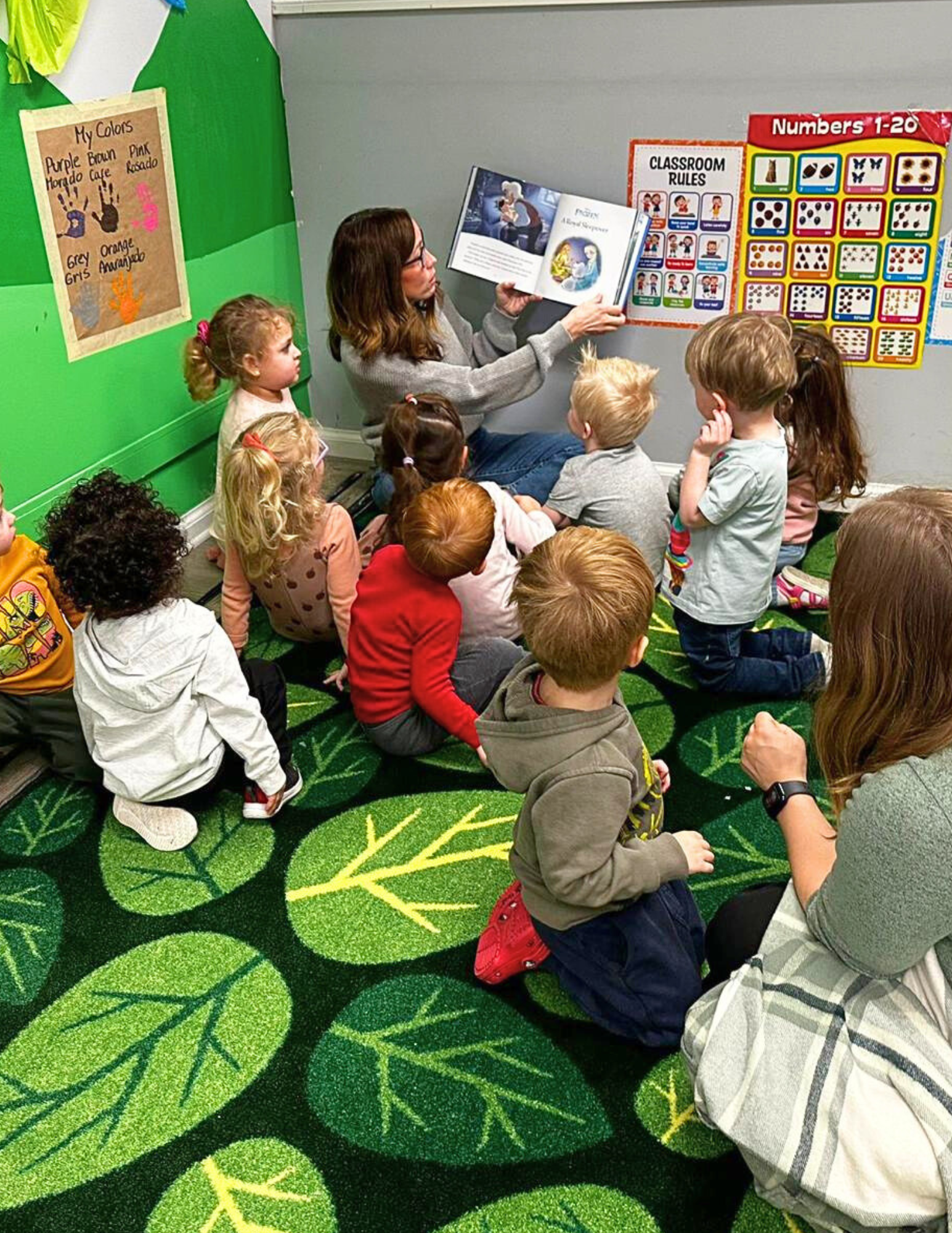 Children reading in classroom at Little Geniuses Learning Center