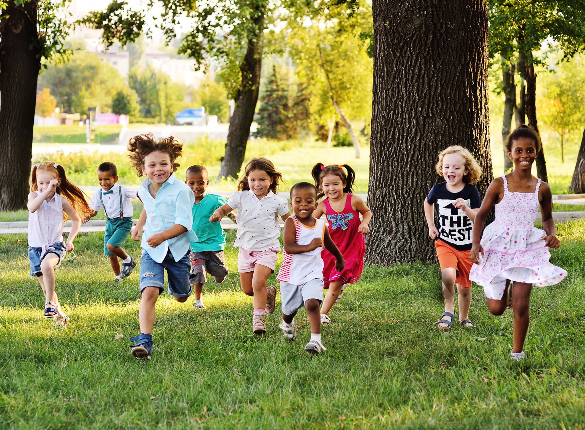 Children running in park